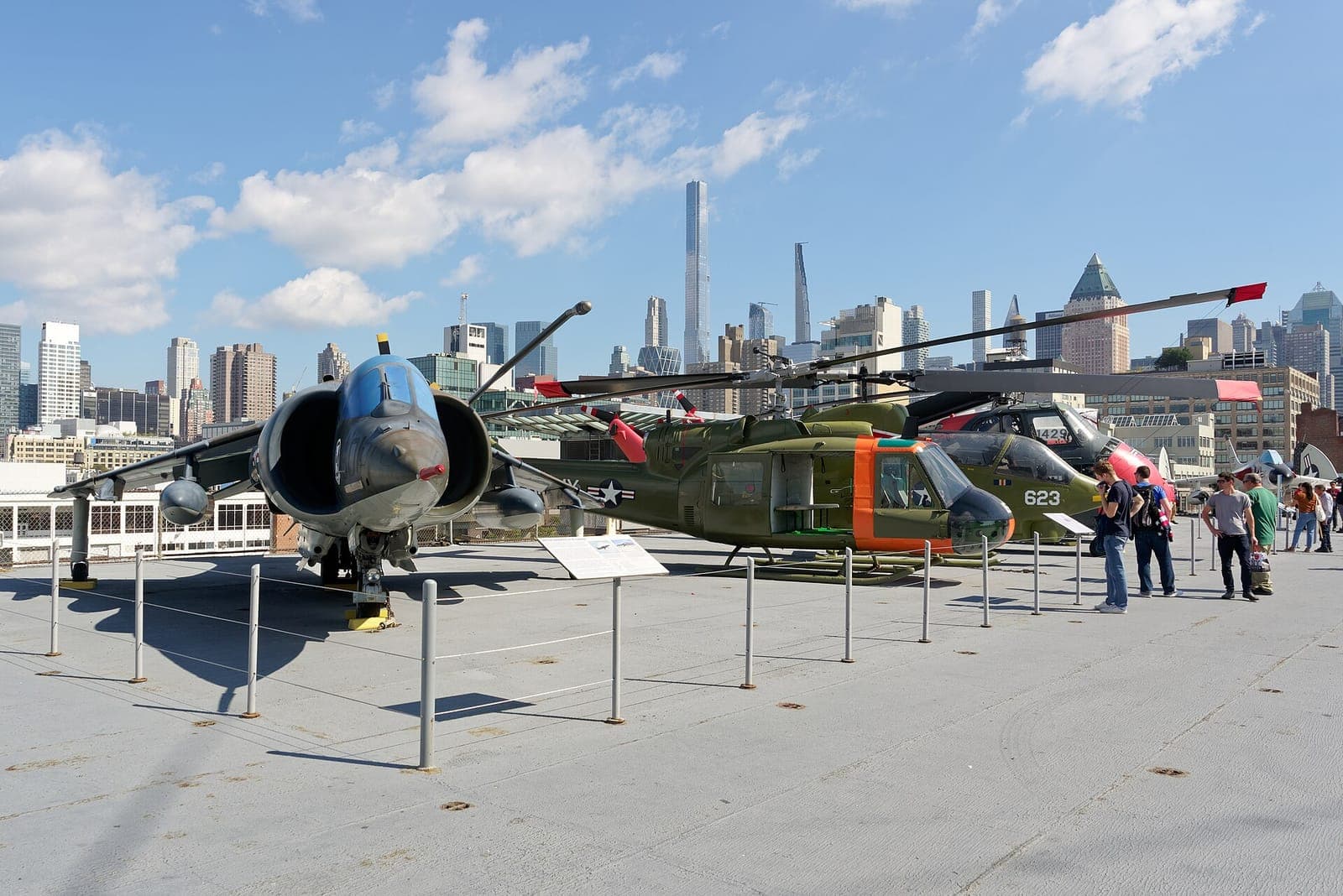 Aircraft on the flight deck of the Intrepid with Manhattan behind